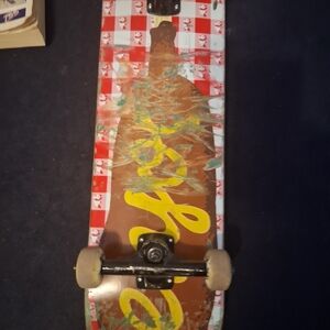 Colorful Skateboard with Red and Yellow Design